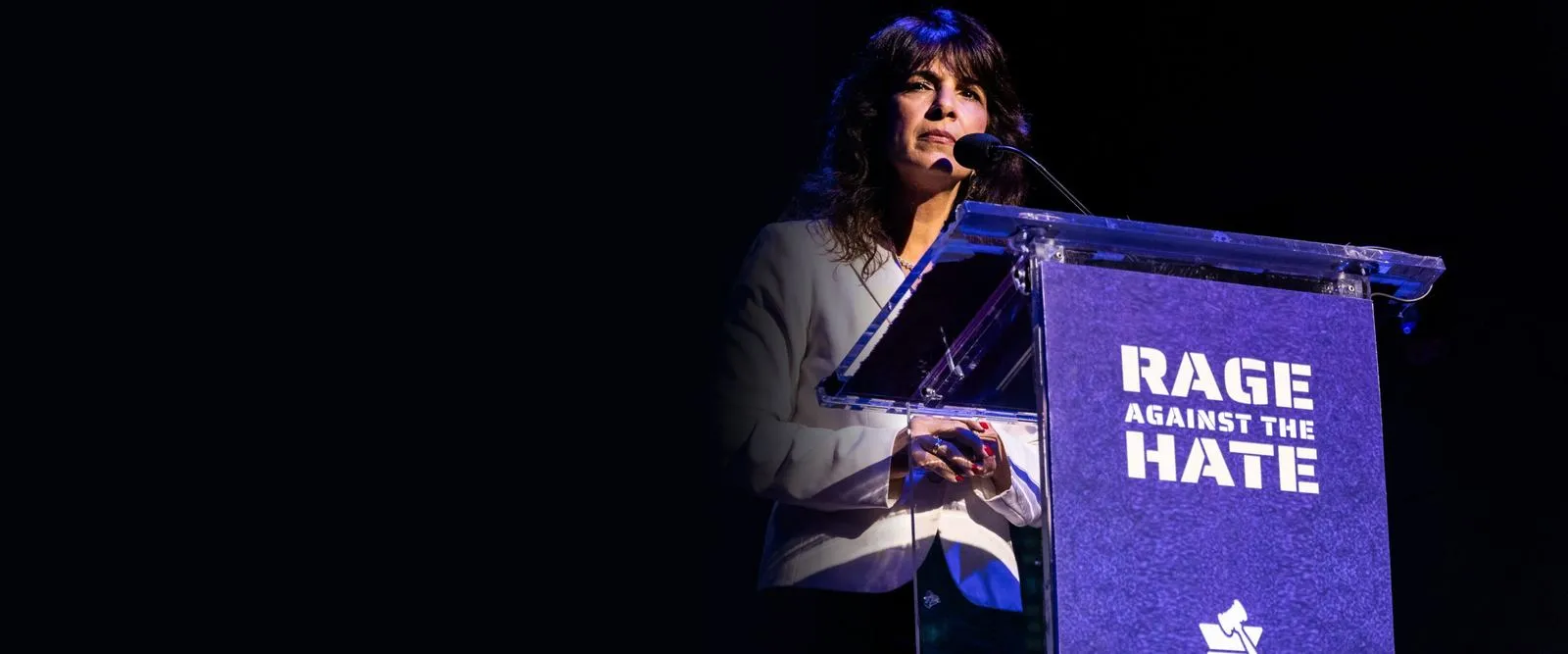 A speaker at the Rage Against the Hate podium, second annual conference, New York, 2025