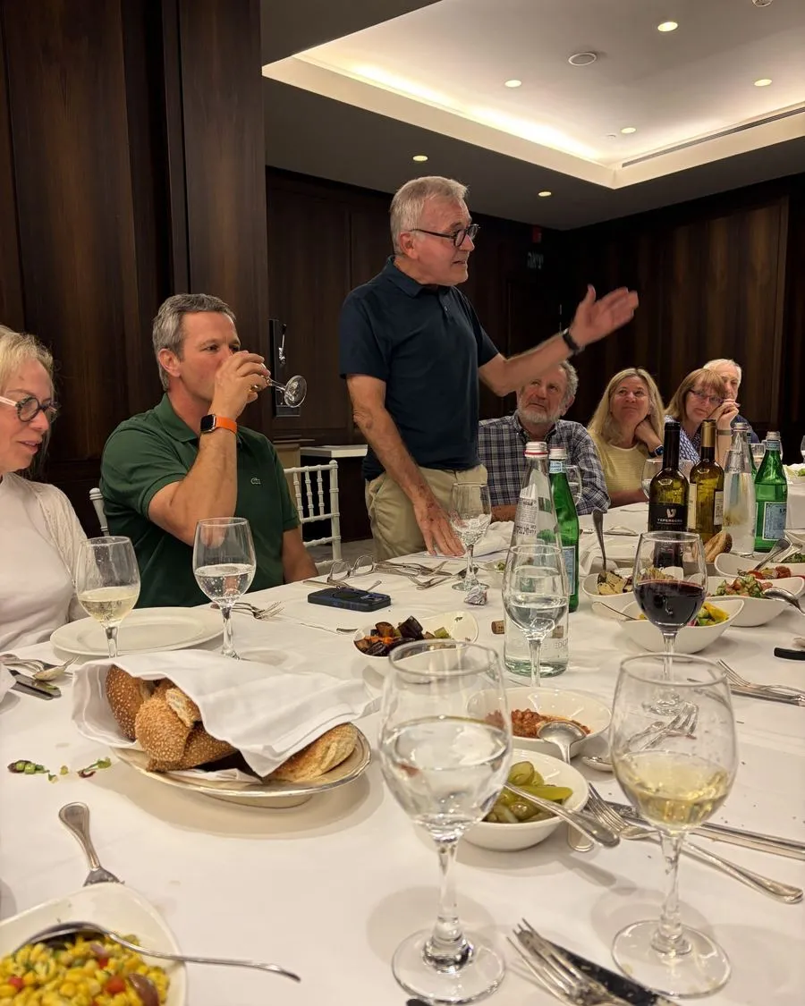 A participant speaks at a mission dinner