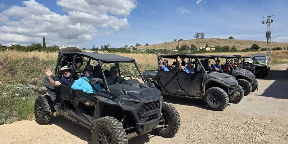 Participants in off-road vehicles in open country