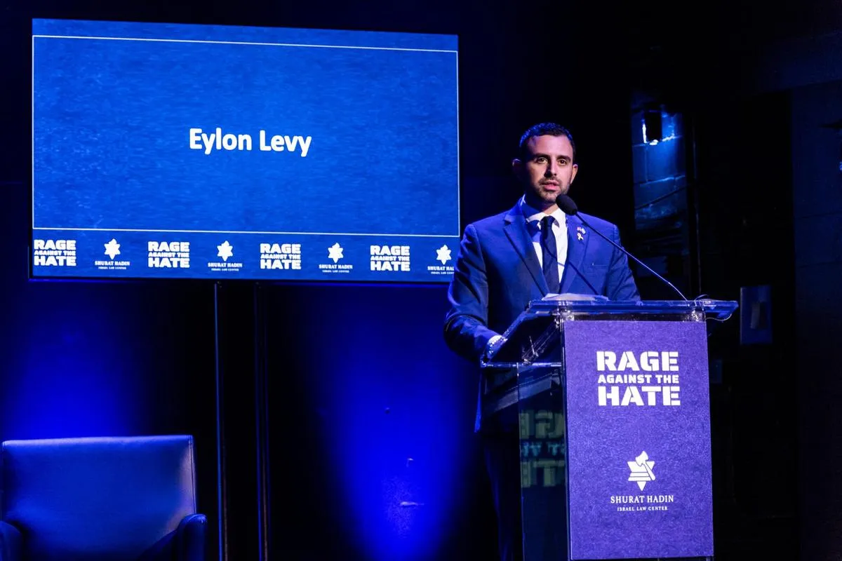 Eylon Levy at the podium